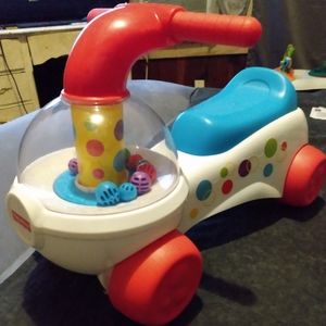 A child fisher price popcorn car